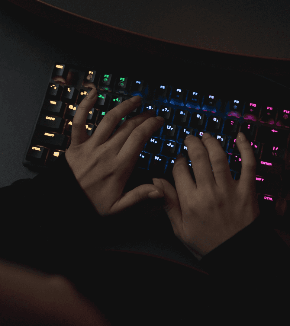 Person typing on a mechanical keyboard